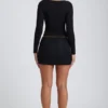 Top a maniche lunghe con ruches Emry in modal nero Top a maniche lunghe con ruches Emry in modal nero