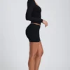 Top a maniche lunghe con ruches Emry in modal nero Top a maniche lunghe con ruches Emry in modal nero