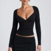 Top a maniche lunghe con ruches Emry in modal nero Top a maniche lunghe con ruches Emry in modal nero