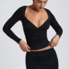 Top a maniche lunghe con ruches Emry in modal nero Top a maniche lunghe con ruches Emry in modal nero