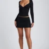 Top a maniche lunghe con ruches Emry in modal nero Top a maniche lunghe con ruches Emry in modal nero