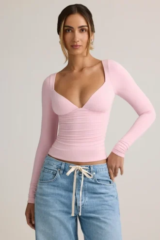 Top a maniche lunghe con ruches Emry Modal in rosa confetto