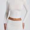 Top a maniche lunghe con ruches in modal Alia, colore bianco Top a maniche lunghe con ruches in modal Alia, colore bianco