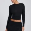 Top a maniche lunghe con ruches in modal Alia, nero Top a maniche lunghe con ruches in modal Alia, nero