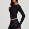 Top a maniche lunghe con scollo a barchetta in Modal Charliane, nero Top a maniche lunghe con scollo a barchetta in Modal Charliane, nero