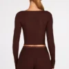 Top a reggiseno con lacci e maniche lunghe in modal a coste Margaux, color cioccolato Top a reggiseno con lacci e maniche lunghe in modal a coste Margaux, color cioccolato
