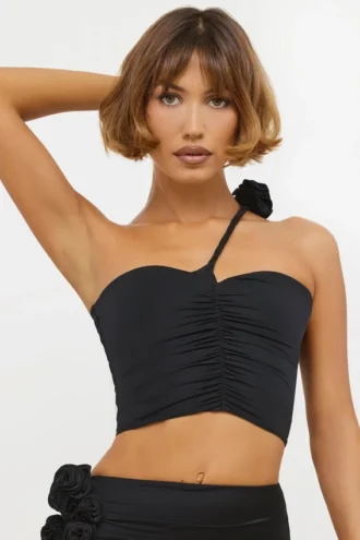 Top asimmetrico in jersey elasticizzato con dettagli a rosa di Tesia in nero