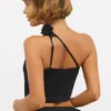 Top asimmetrico in jersey elasticizzato con dettagli a rosa di Tesia in nero Top asimmetrico in jersey elasticizzato con dettagli a rosa di Tesia in nero