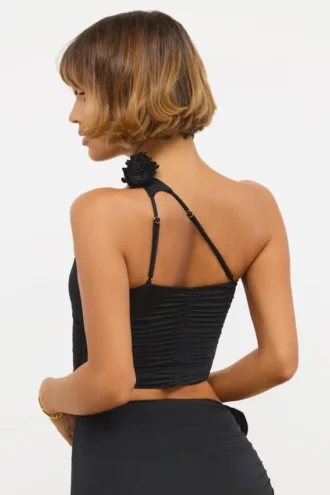 Top asimmetrico in jersey elasticizzato con dettagli a rosa di Tesia in nero