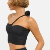 Top asimmetrico in jersey elasticizzato con dettagli a rosa di Tesia in nero Top asimmetrico in jersey elasticizzato con dettagli a rosa di Tesia in nero