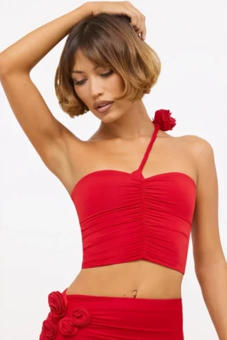 Top asimmetrico in jersey elasticizzato con dettagli a rose di Tesia in rosso scarlatto