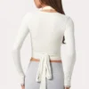 Top avvolgente in jersey morbido color latte Top avvolgente in jersey morbido color latte