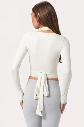 Top avvolgente in jersey morbido color latte