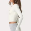 Top avvolgente in jersey morbido color latte Top avvolgente in jersey morbido color latte
