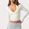 Top avvolgente in jersey morbido color latte Top avvolgente in jersey morbido color latte