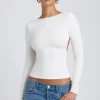 Top bianco a collo alto con maniche lunghe e schiena scoperta in modal Elli