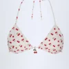 Top bikini a triangolo con dettagli charm Calella con stampa ciliegia Top bikini a triangolo con dettagli charm Calella con stampa ciliegia