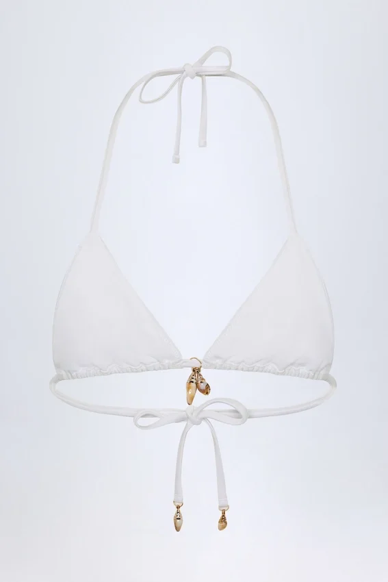 Top bikini a triangolo con dettagli charm Comoros in bianco Top bikini a triangolo con dettagli charm Comoros in bianco