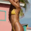 Slip Bikini con lacci decorati Bali in giallo dorato Slip Bikini con lacci decorati Bali in giallo dorato