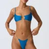 Top bikini con cut-out e decorazioni a catena Sanibel in blu oceano Top bikini con cut-out e decorazioni a catena Sanibel in blu oceano