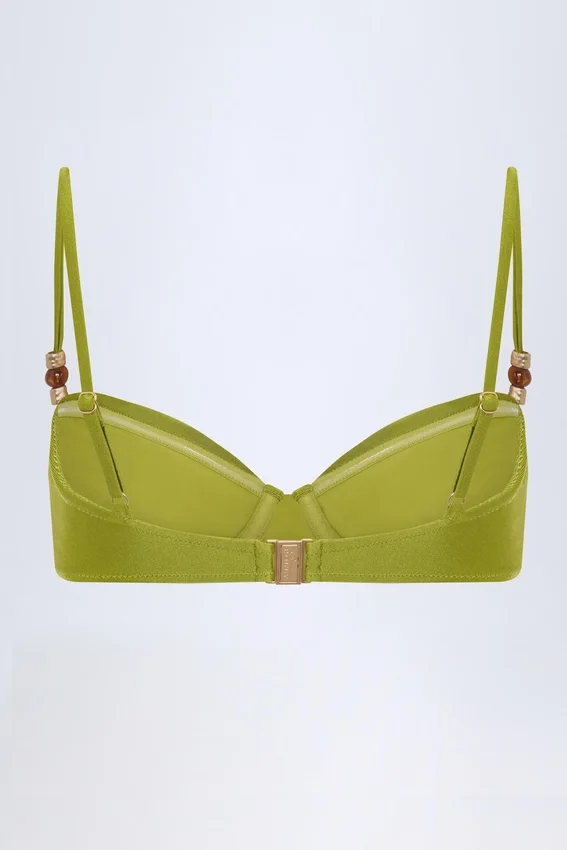 Top bikini con ferretto arricciato e decorazioni in perline Bruny in verde oliva Top bikini con ferretto arricciato e decorazioni in perline Bruny in verde oliva