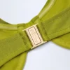 Top bikini con ferretto arricciato e decorazioni in perline Bruny in verde oliva Top bikini con ferretto arricciato e decorazioni in perline Bruny in verde oliva