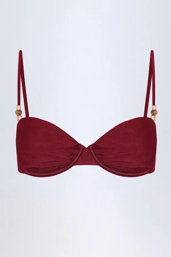 Top bikini con ferretto e ruches impreziosito da perline Bruny in ciliegia scuro Top bikini con ferretto e ruches impreziosito da perline Bruny in ciliegia scuro