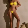 Top bikini con ferretto e spalline multiple Positano in giallo dorato Top bikini con ferretto e spalline multiple Positano in giallo dorato