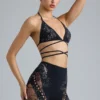 Top bikini con spalline incrociate e decorazioni Liberty in nero Top bikini con spalline incrociate e decorazioni Liberty in nero