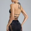 Top bikini con spalline incrociate e decorazioni Liberty in nero Top bikini con spalline incrociate e decorazioni Liberty in nero
