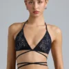 Top bikini con spalline incrociate e decorazioni Liberty in nero Top bikini con spalline incrociate e decorazioni Liberty in nero