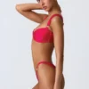 Top bikini decorato Coquina in rosa lampone Top bikini decorato Coquina in rosa lampone