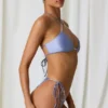 Top bikini incrociato con scollo all’americana e dettagli in perla Cortez in viola lavanda Top bikini incrociato con scollo all’americana e dettagli in perla Cortez in viola lavanda
