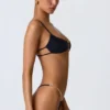 Top bikini nero con cut-out e decorazioni a catena Sanibel Top bikini nero con cut-out e decorazioni a catena Sanibel