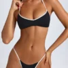 Top bikini reversibile con scollo all’americana Zuma in nero Top bikini reversibile con scollo all’americana Zuma in nero