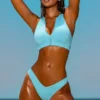 Top bikini Sporty Swim con zip in turchese