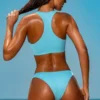 Top bikini Sporty Swim con zip in turchese
