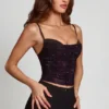 Top con collo a cappuccio e decorazioni Armelia in serpente viola Top con collo a cappuccio e decorazioni Armelia in serpente viola