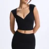 Top Cora in Modal con maniche ad aletta e ruches, colore nero