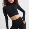 Top corto a collo alto Soft Active in nero
