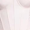 Top corto a corsetto con ferretti in vinile Cassandra, bianco Top corto a corsetto con ferretti in vinile Cassandra, bianco