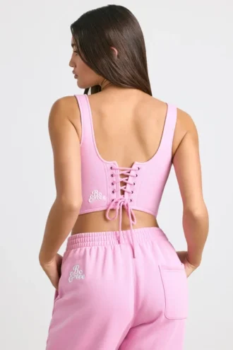Top corto a corsetto in jersey spazzolato rosa bubblegum