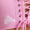 Top corto a corsetto in jersey spazzolato rosa bubblegum Top corto a corsetto in jersey spazzolato rosa bubblegum