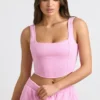 Top corto a corsetto in jersey spazzolato rosa bubblegum Top corto a corsetto in jersey spazzolato rosa bubblegum