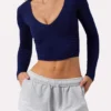 Top corto a maniche lunghe con arricciature in blu navy