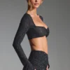 Top corto a maniche lunghe con decorazioni Lumina in nero Top corto a maniche lunghe con decorazioni Lumina in nero