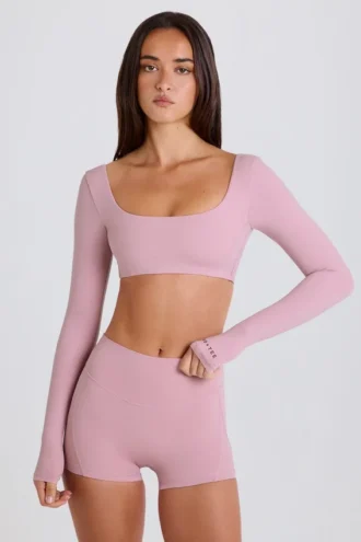 Top corto a maniche lunghe in color malva