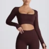 Top corto a maniche lunghe senza cuciture Super Sculpt color cioccolato Top corto a maniche lunghe senza cuciture Super Sculpt color cioccolato
