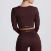 Top corto a maniche lunghe senza cuciture Super Sculpt color cioccolato Top corto a maniche lunghe senza cuciture Super Sculpt color cioccolato