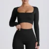 Top corto a maniche lunghe senza cuciture Super Sculpt in nero Top corto a maniche lunghe senza cuciture Super Sculpt in nero